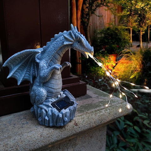 Yardancer dragon outdoor statue perched on base demonstrates reliable solar charging.