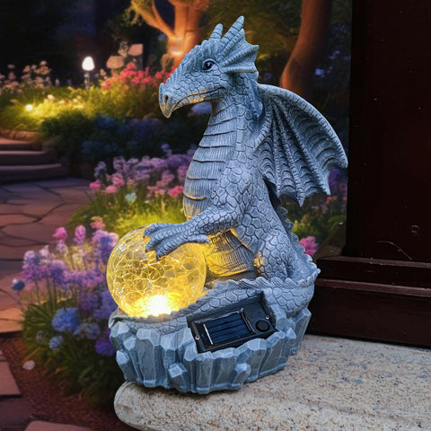 Yardancer hand-painted resin dragon perched on stone adds curb appeal.
