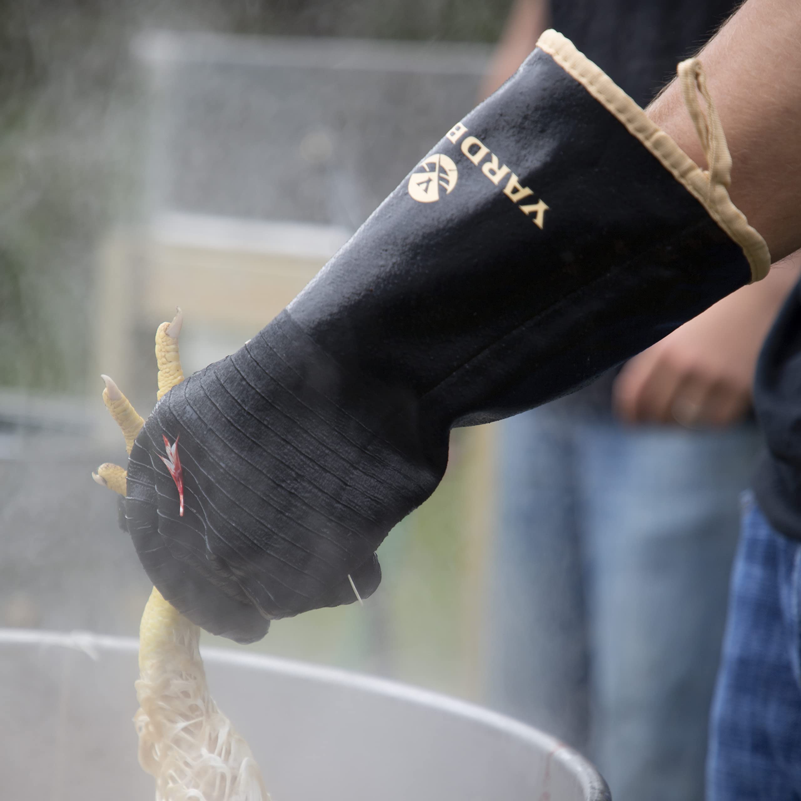 Yardbird Poultry Gloves extra-long cuffs shield forearms during scalding.
