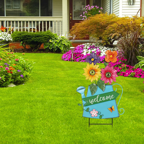 Sturdy metal stake stands firmly in soil for outdoor display.