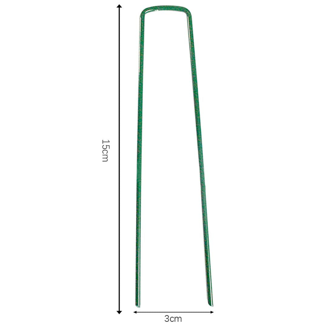 Yeasing garden pegs 6-inch U-shaped stake stabilizing tomato cages in soil.