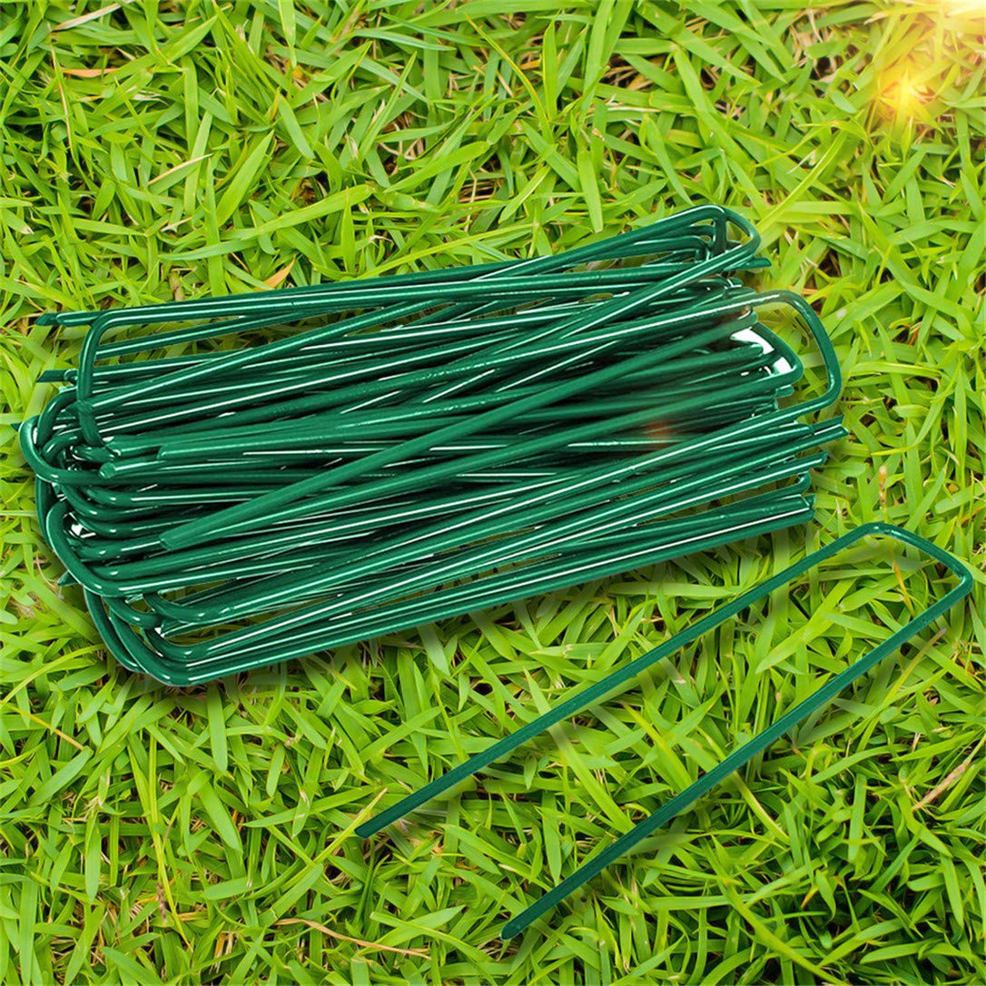 Yeasing garden pegs 6-inch stake securing chicken wire for a sturdy outdoor barrier.