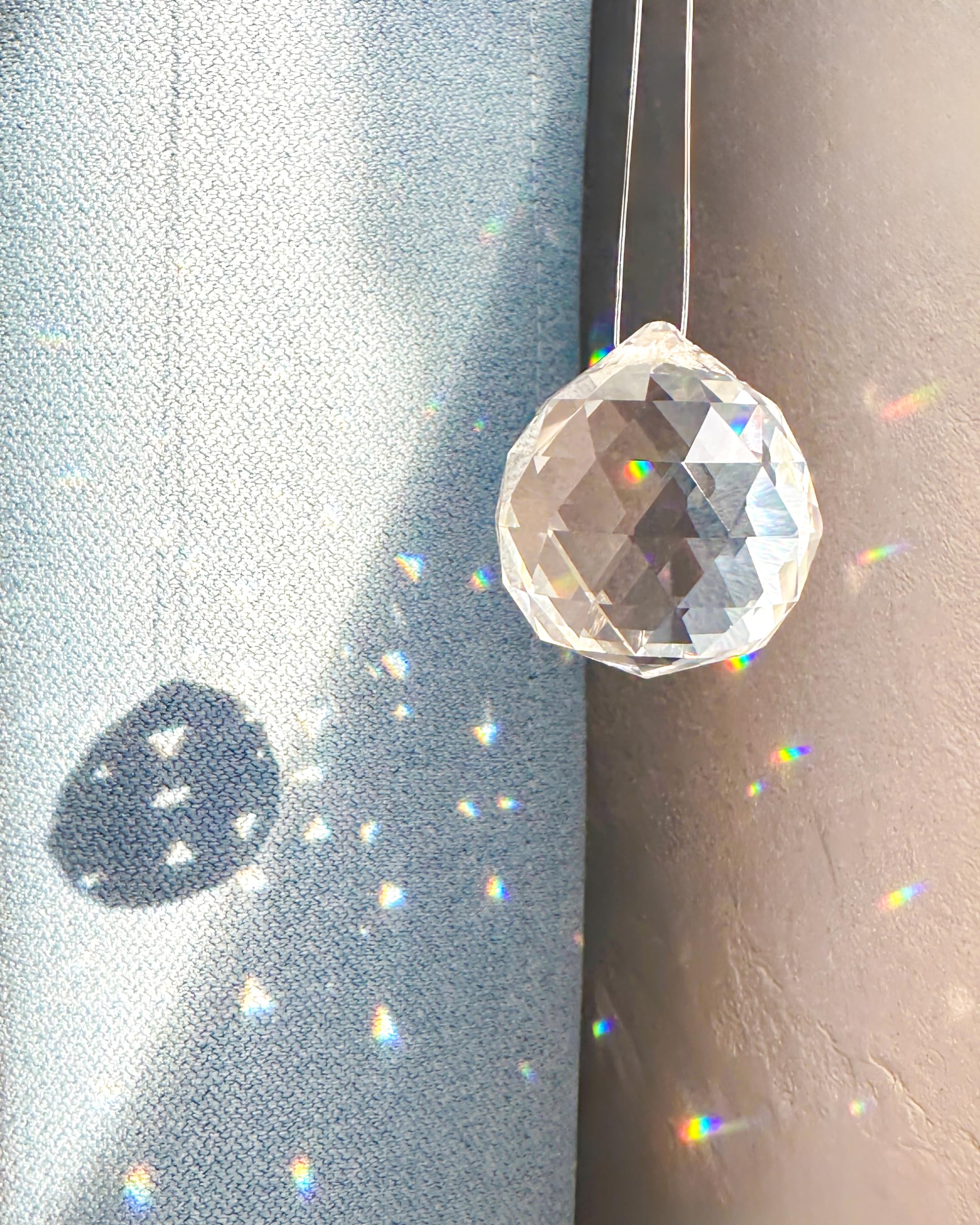 YEOAUM Window sun catcher adds a colorful glow to gardens and outdoor areas.