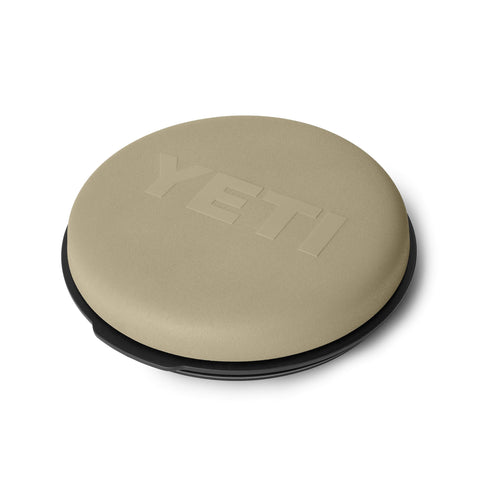 YETI LoadOut bucket with swivel seat provides field comfort during long tasks.
