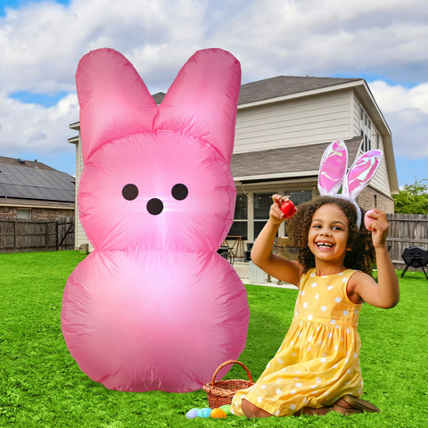 YGCTBVY pink bunny yard decoration secured with stakes for stability.