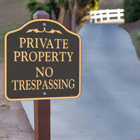 YHAIATTA signs mounted on a fence clearly marking private property.