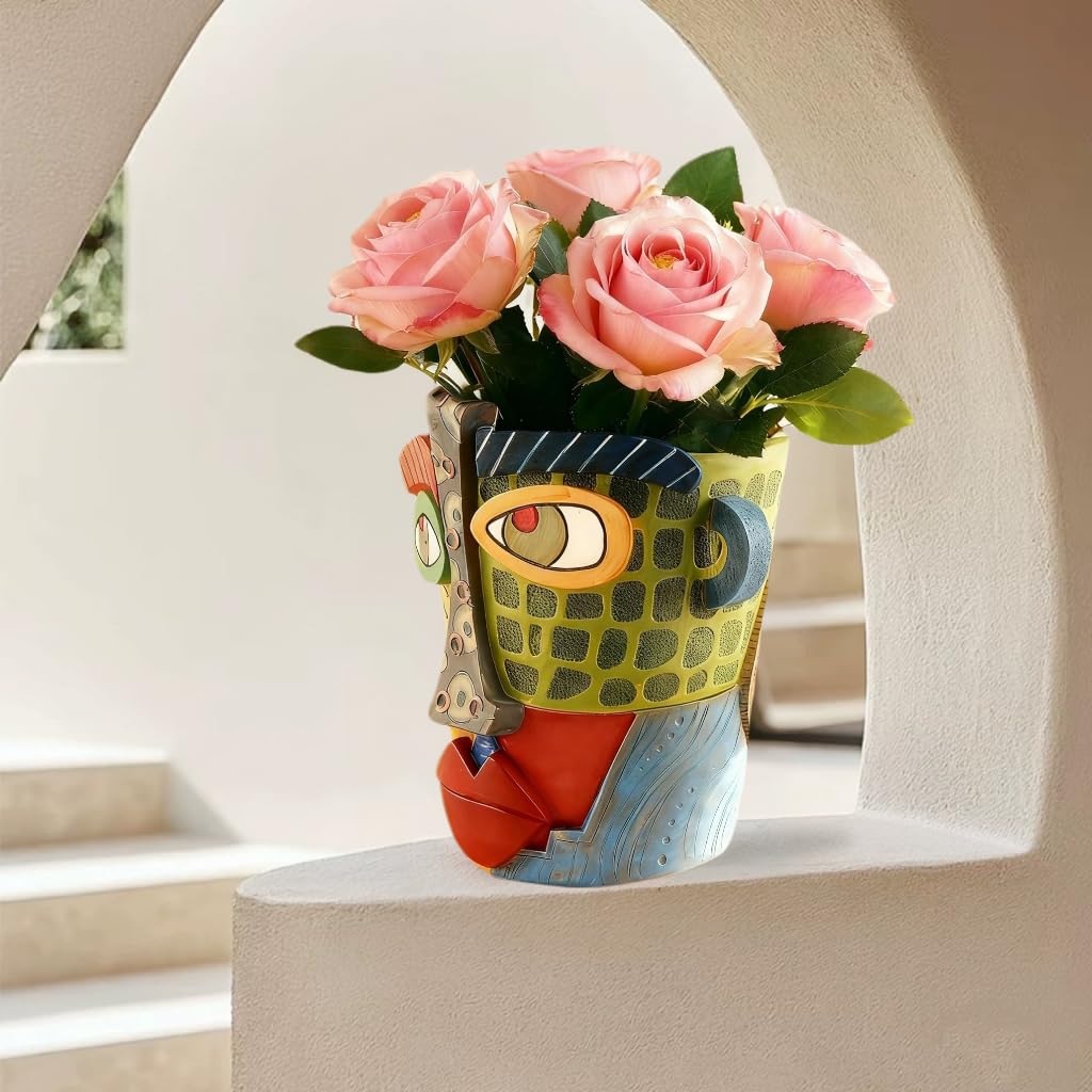 Yhupl Unique art planter doubles as a striking decorative accent.