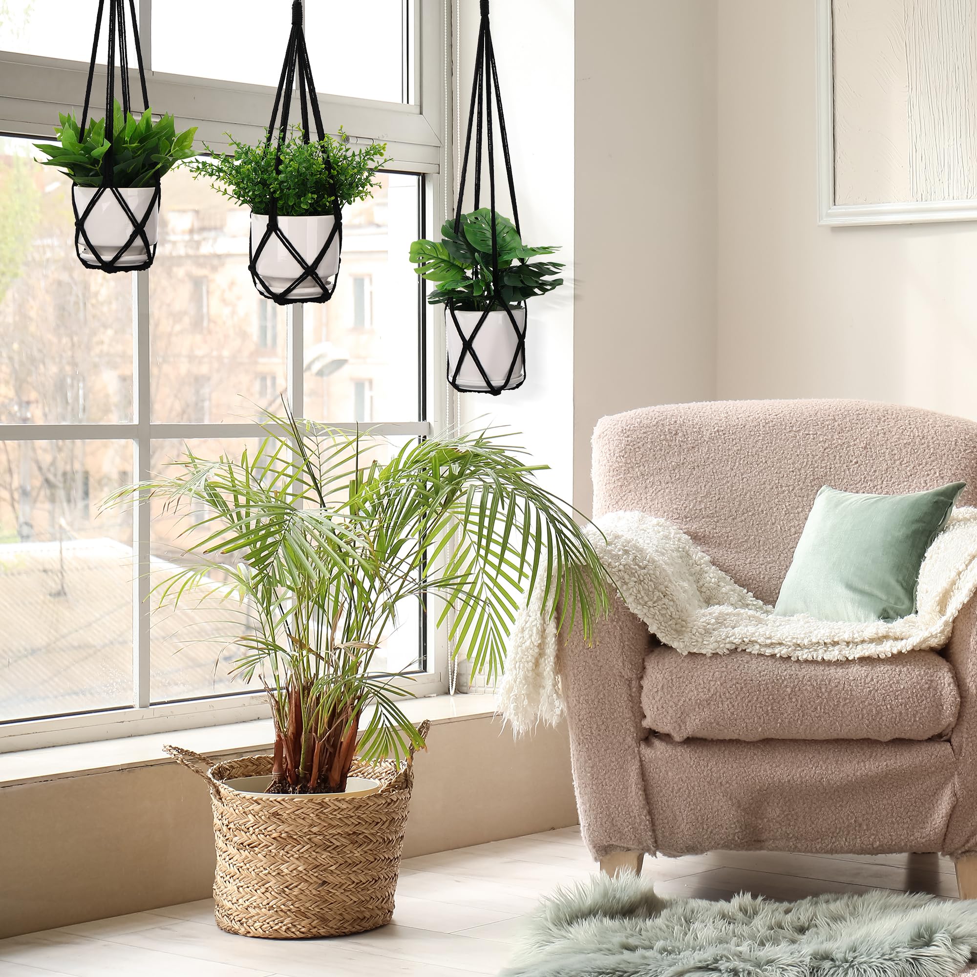 YIBOT macrame plant hanger on balcony for outdoor charm.
