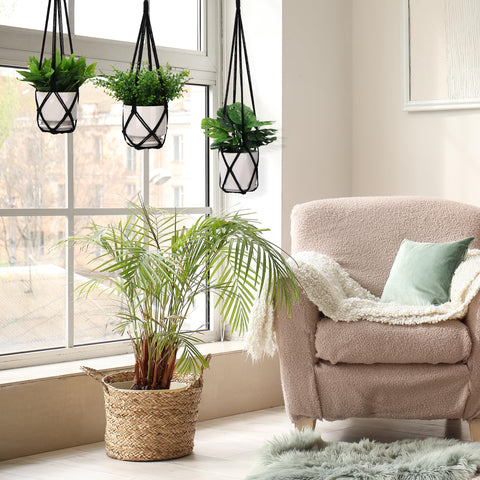 YIBOT macrame plant hanger on balcony for outdoor charm.