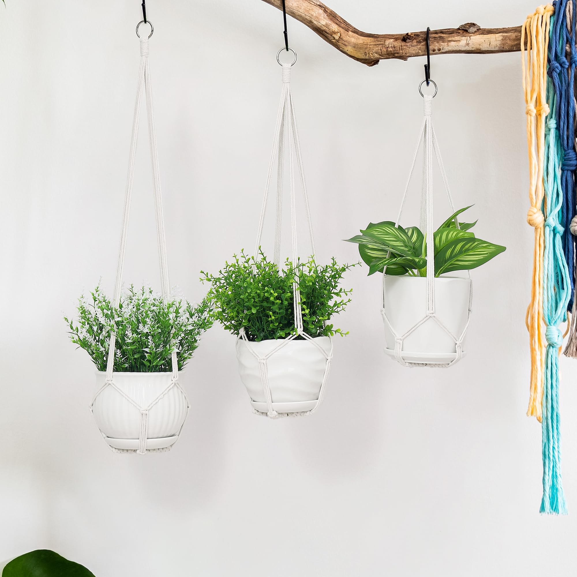 YIBOT plant hanger displays pots in a corner for visual depth.