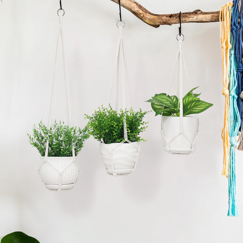 YIBOT plant hanger displays pots in a corner for visual depth.