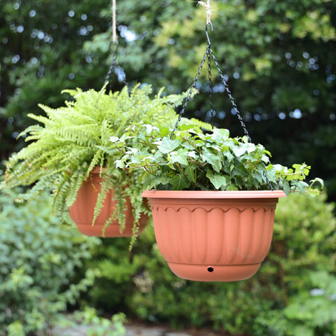 YIKUSH decorative terracotta hanging planter with water tray reducing spill risk