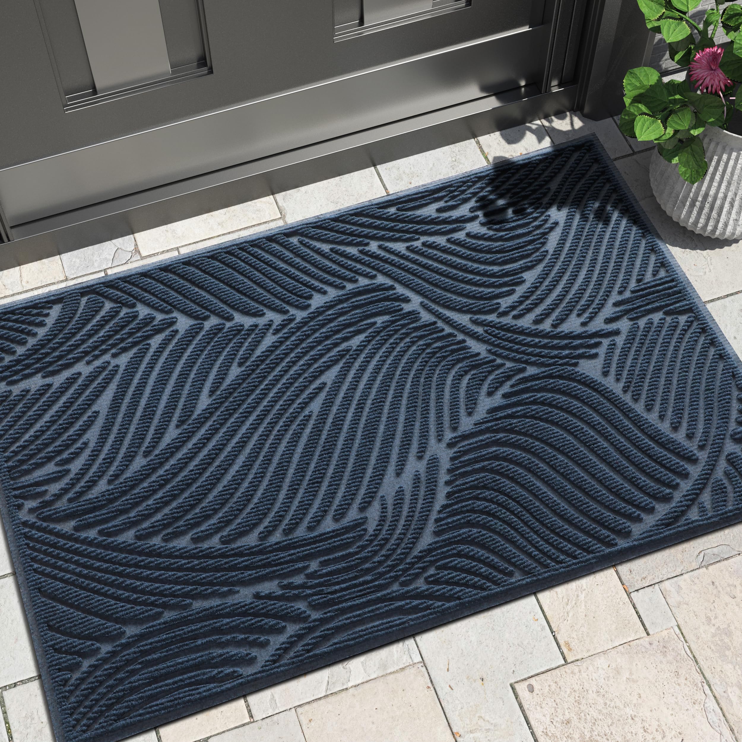 Yimobra doormat with artistic line design enhances entryway and traps dirt.