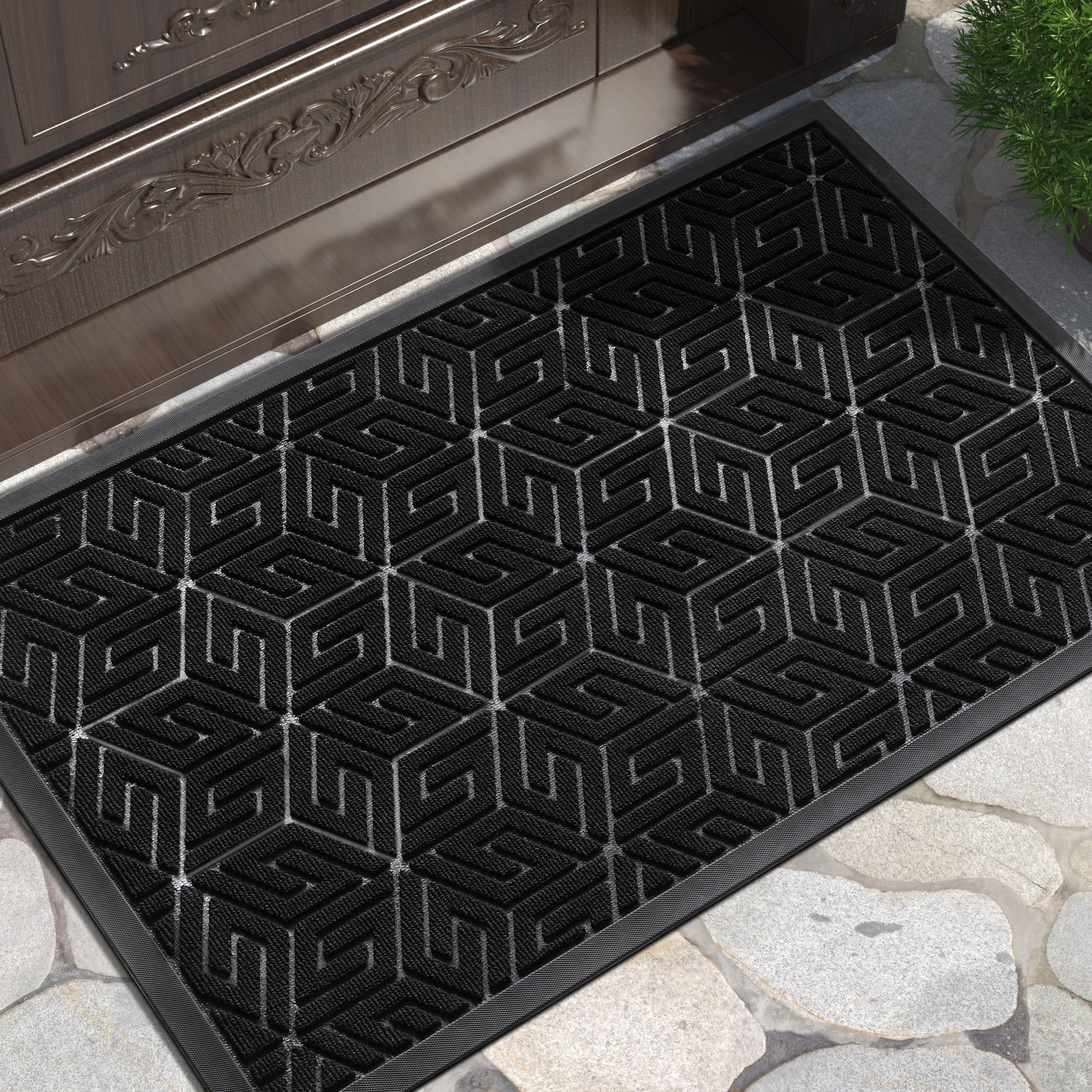 Yimobra doormat at front entrance with groove pattern that captures dirt, helping keep floors clean.
