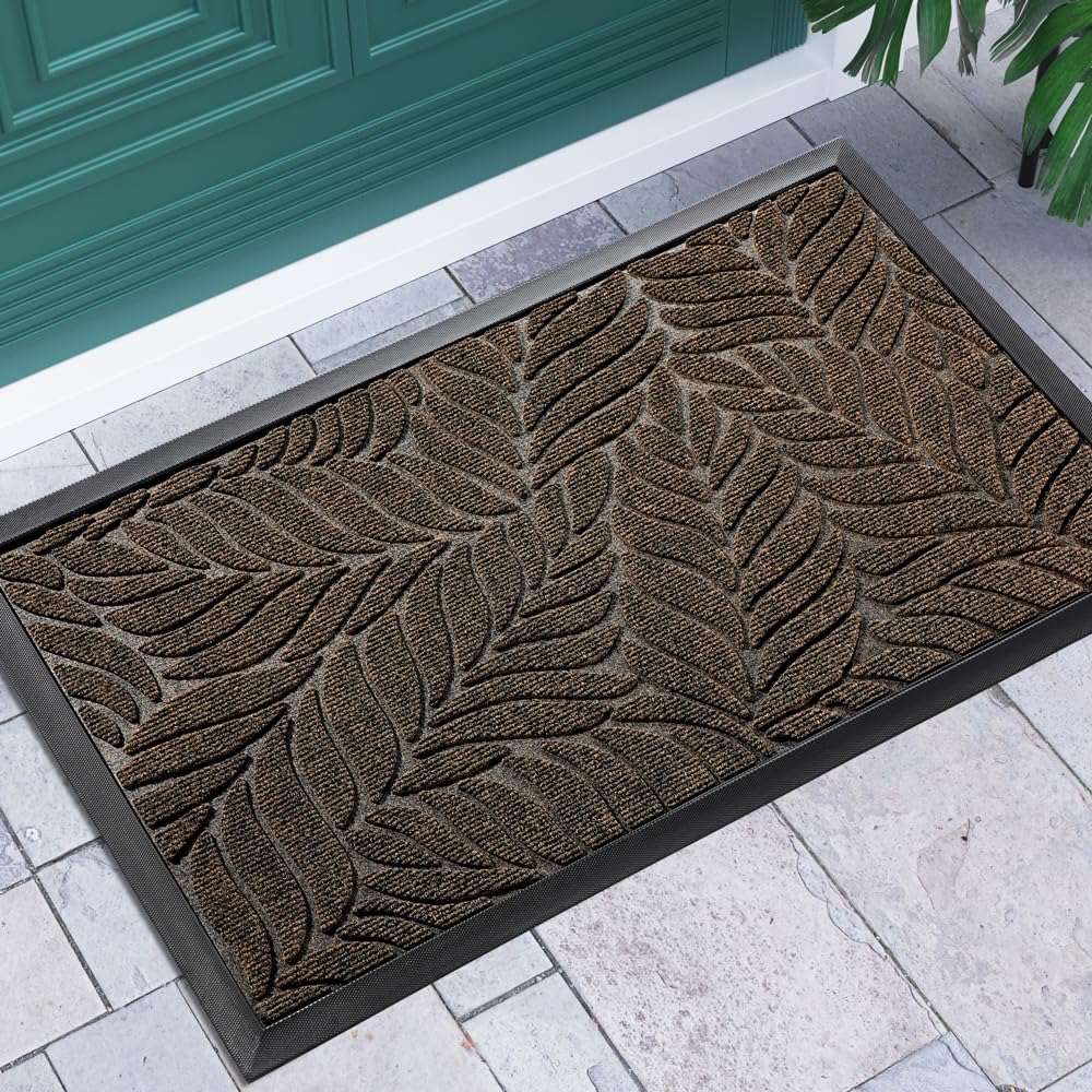 Yimobra front door mat with leaf-pattern design traps debris at the doorstep.