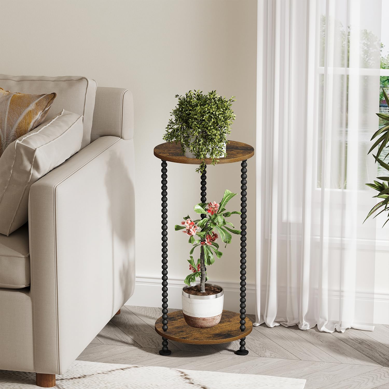 YINMIT 23-inch tall plant stand elevates plants for better viewing and access.
