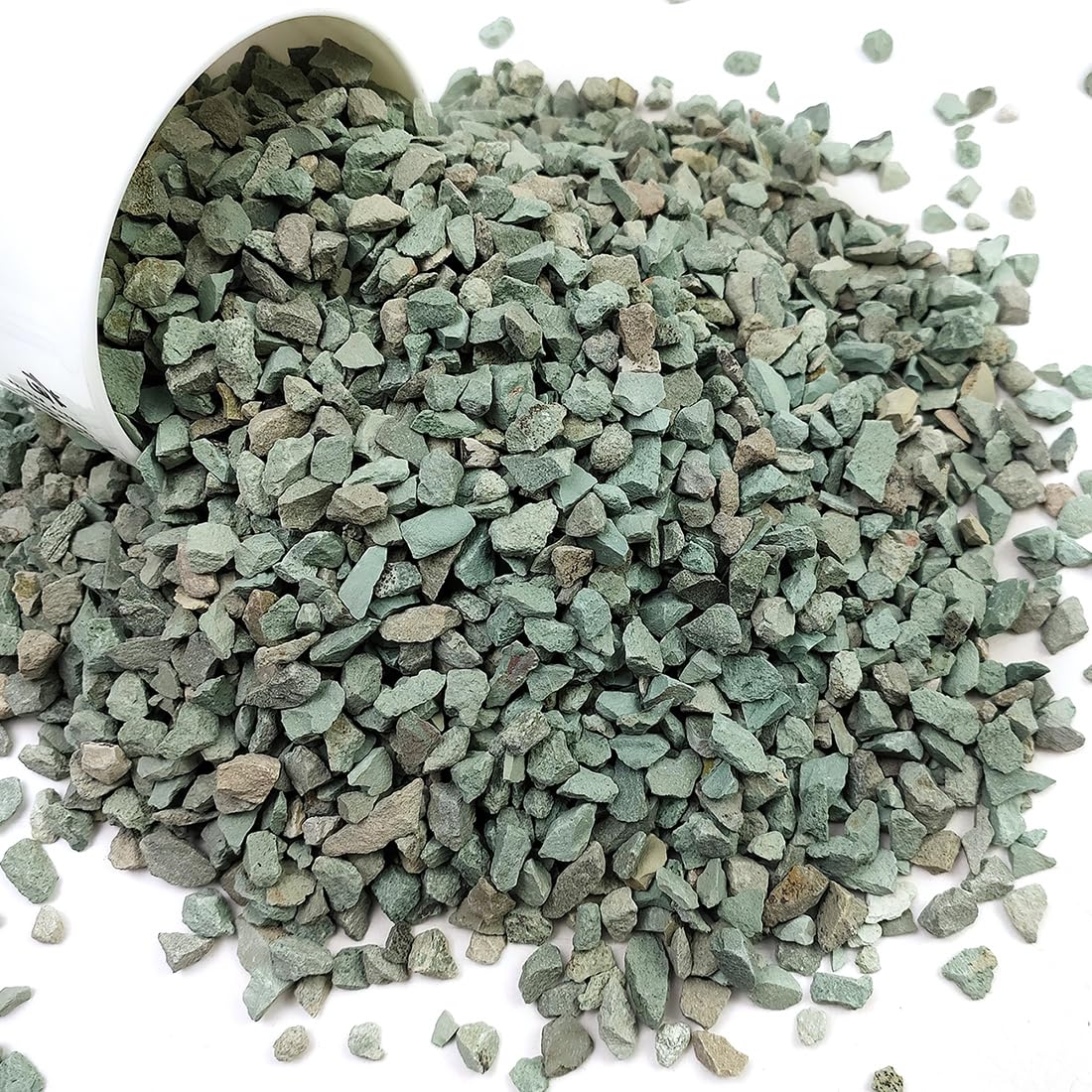 YISZM green zeolite rocks around the plant base improve stability and drainage.