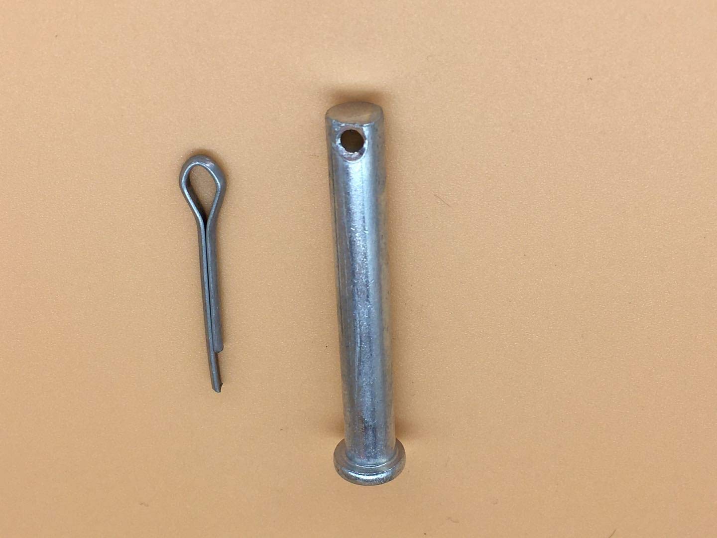 Detail of 1-85-inch length pins for secure mounting on machines.