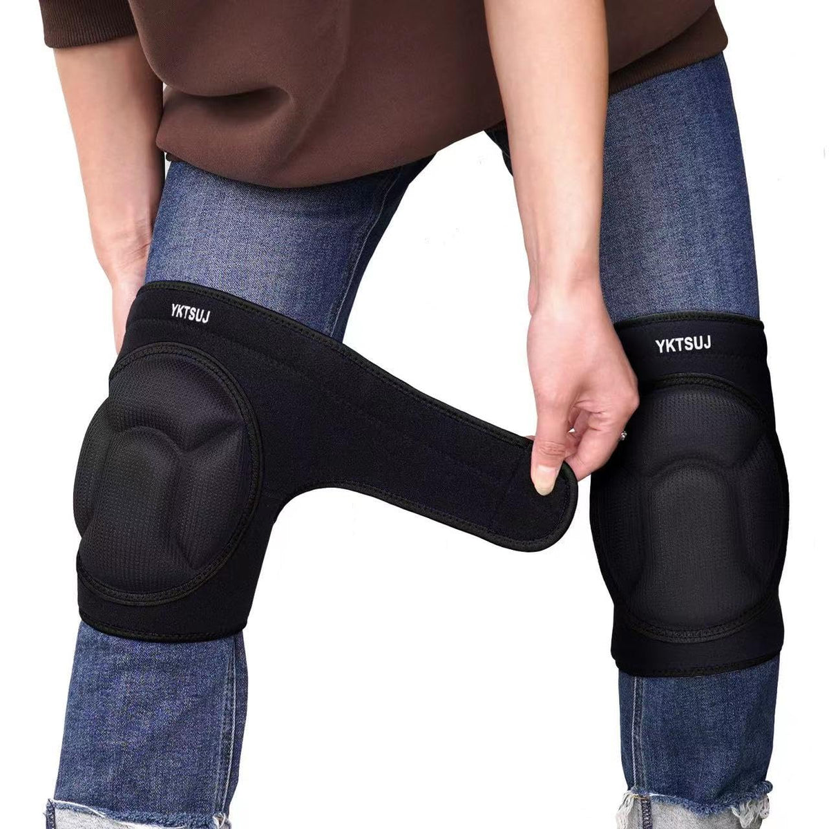YKTSUJ knee pad worn for comfortable kneeling during cleaning and gardening.