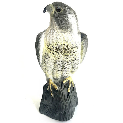 YOFIT Horned Hawk Decoy perched to deter garden birds effectively.