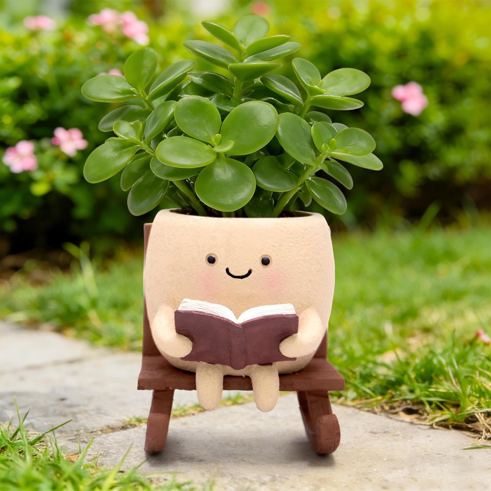 YOUOIVIA smiley-face planter on rocking chair adds cheerful decor