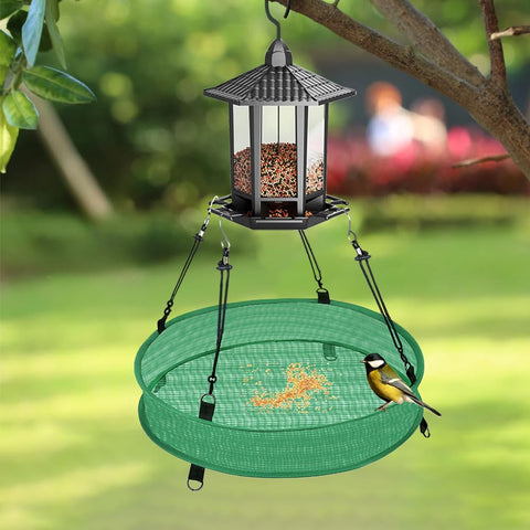YPDiXDi bird seed catcher tray in green blends with garden surroundings.