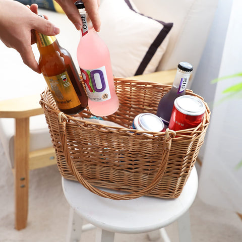 YRLSOTGE wicker storage basket used for blankets and toys.