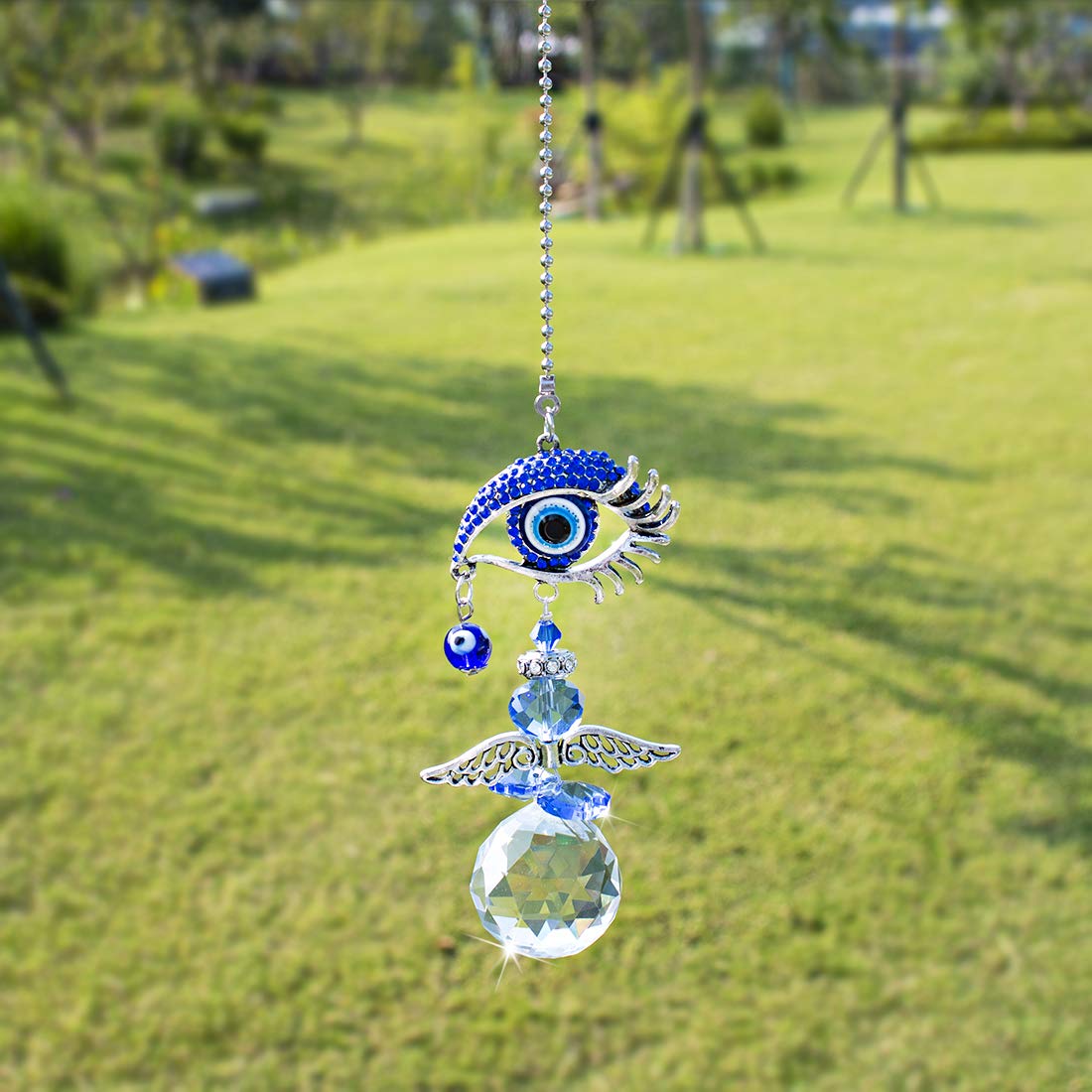 YU FENG 12.5-inch crystal suncatcher casts luminous prisms across walls and ceilings.