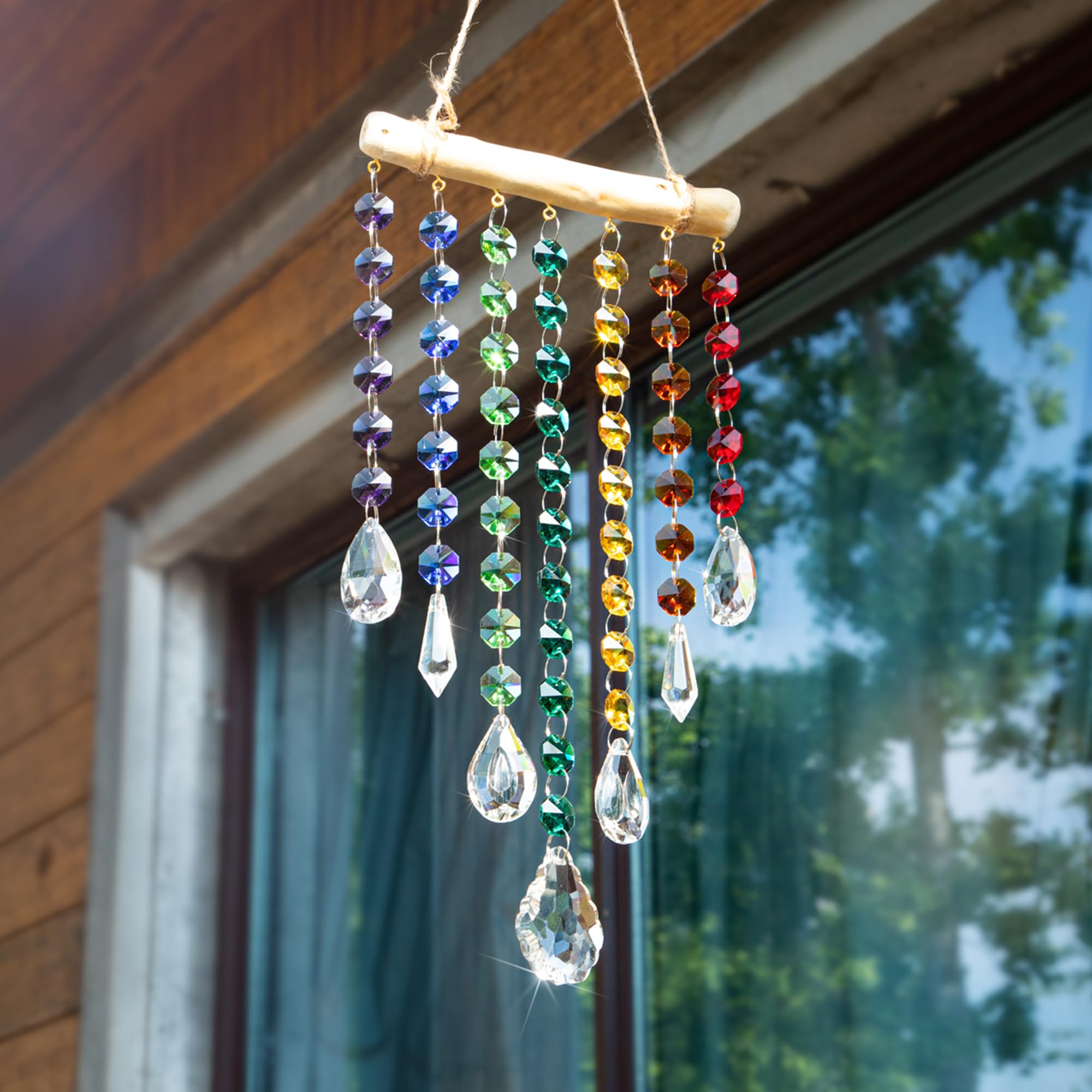 YU FENG car rearview mirror suncatcher adds subtle sparkle.