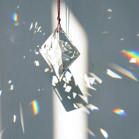 YU FENG convex crystal pendant captures sunlight for vibrant decor.