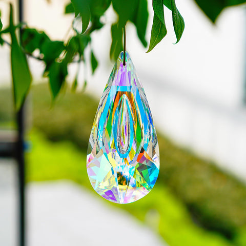 YU FENG crystal prism creates colorful light displays when sunlight passes through
