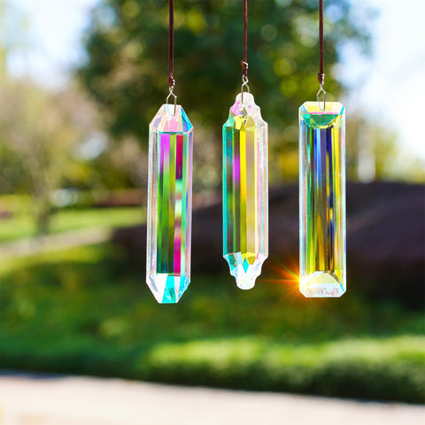 YU FENG crystal prisms diffuse light to create soft, colorful halos.