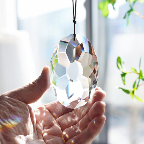 YU FENG garden decor crystal suncatcher adds shimmering focal point.