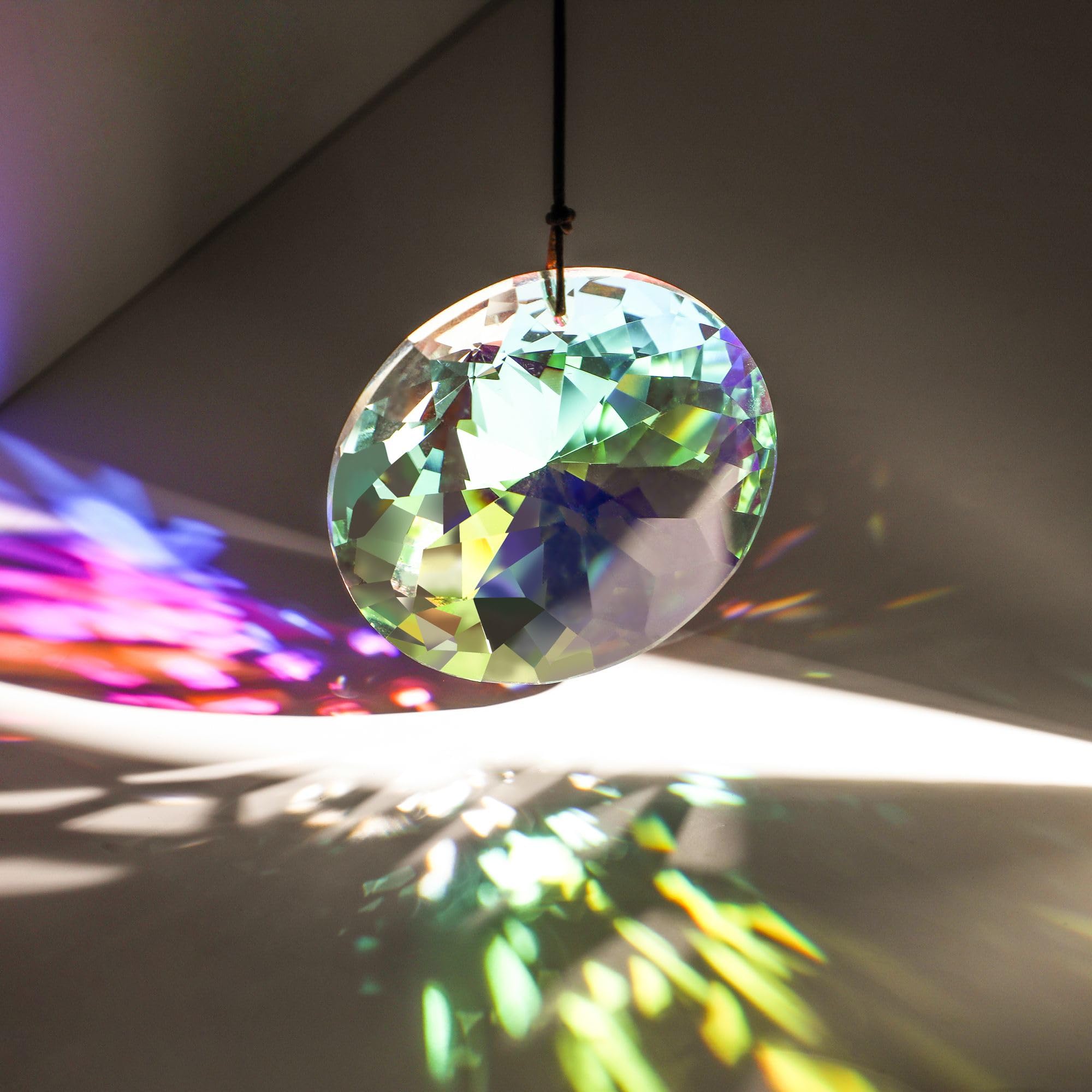 YU FENG rainbow-maker crystal pendant brightening spaces with color