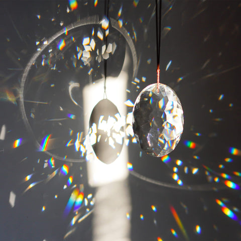 YU FENG rainbow maker crystal prism enhances home decor with sparkle.