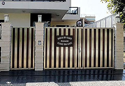 Yuntarda Dogs in Yard sign mounted on a gate to deter entry