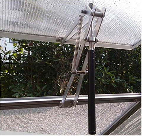 Yziixi greenhouse opener in operation—window lifted in greenhouse to regulate temperature.