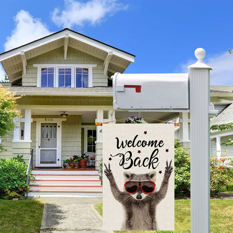 ZAEW Welcome Back Raccoon flag mounted on a flagpole for quick outdoor decoration.