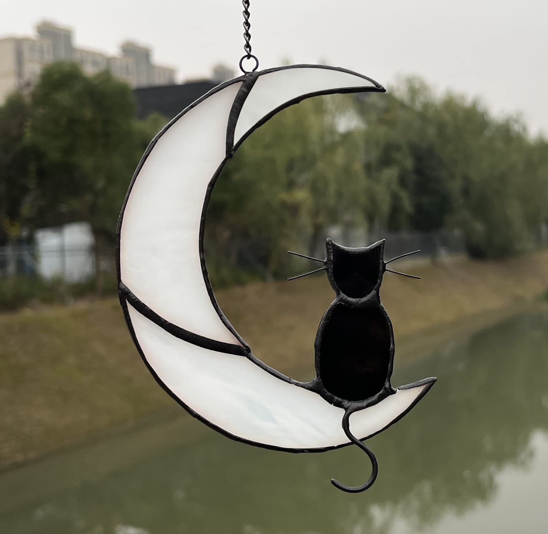 ZUAJITER stained glass cat suncatcher showcasing sunlit color play