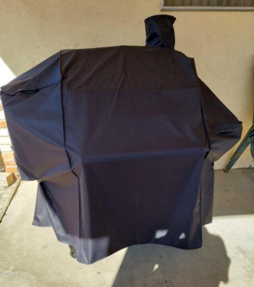 Cover placed over grill ready for off-season storage by ZBXFCSH.
