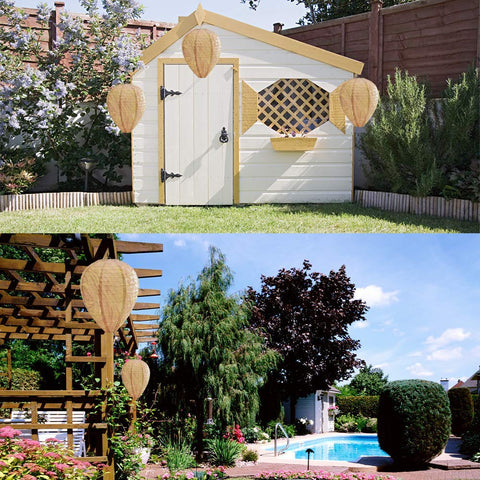 ZeeDix wasp nest decoy on a tree for yard-friendly pest deterrence and decoration.