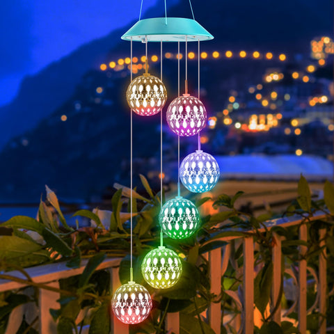 Zeiliuled solar Moroccan ball wind chime for outdoor ambiance at night.