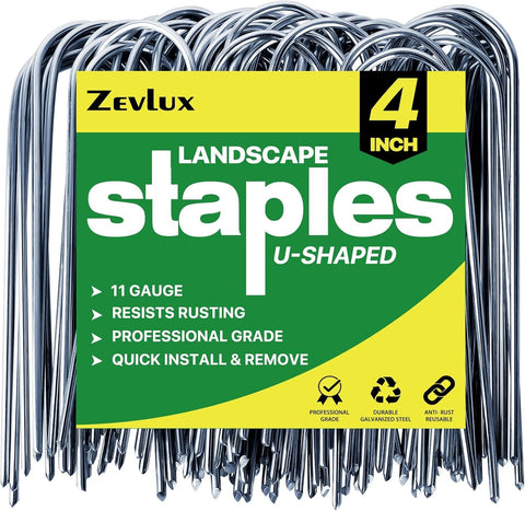 Zevlux 4-inch U-shape stakes securing irrigation tubing with strong hold.