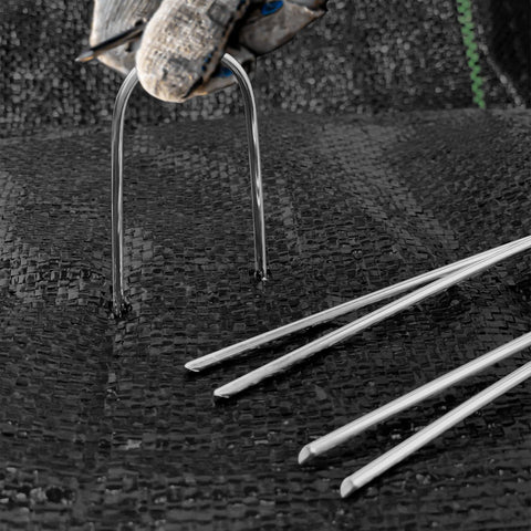 Zevlux storage box with 40 galvanized stakes organized for reuse.