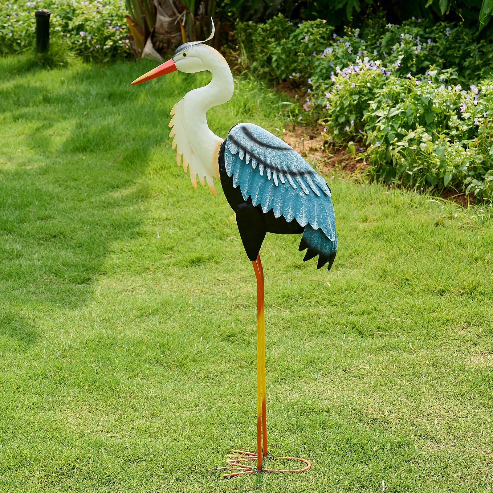 ZioWio crane garden statue in blue tones enhances outdoor ambiance.