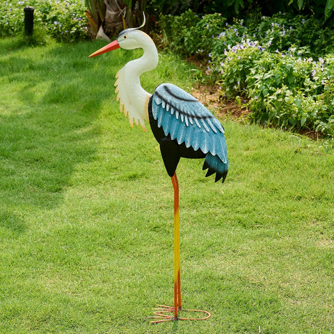 ZioWio crane garden statue in blue tones enhances outdoor ambiance.