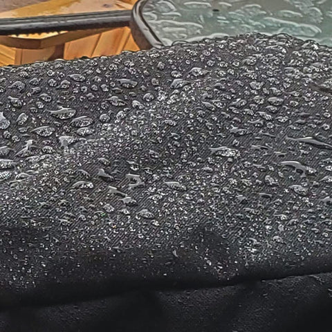 ZJYWSCH Koda 2 Pro 18 inch cover weather resistance shown on rainy days.