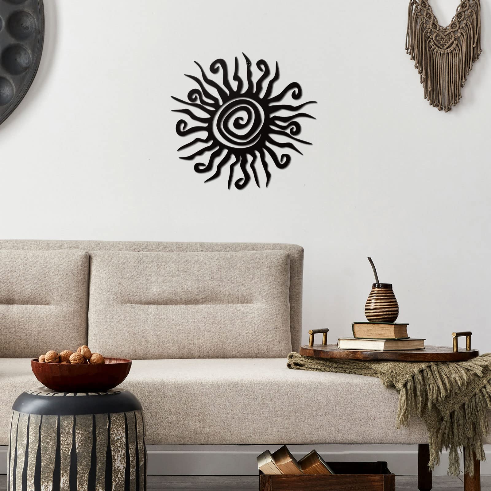 Zonon sun wall art in black finish offers a sleek garden focal point.