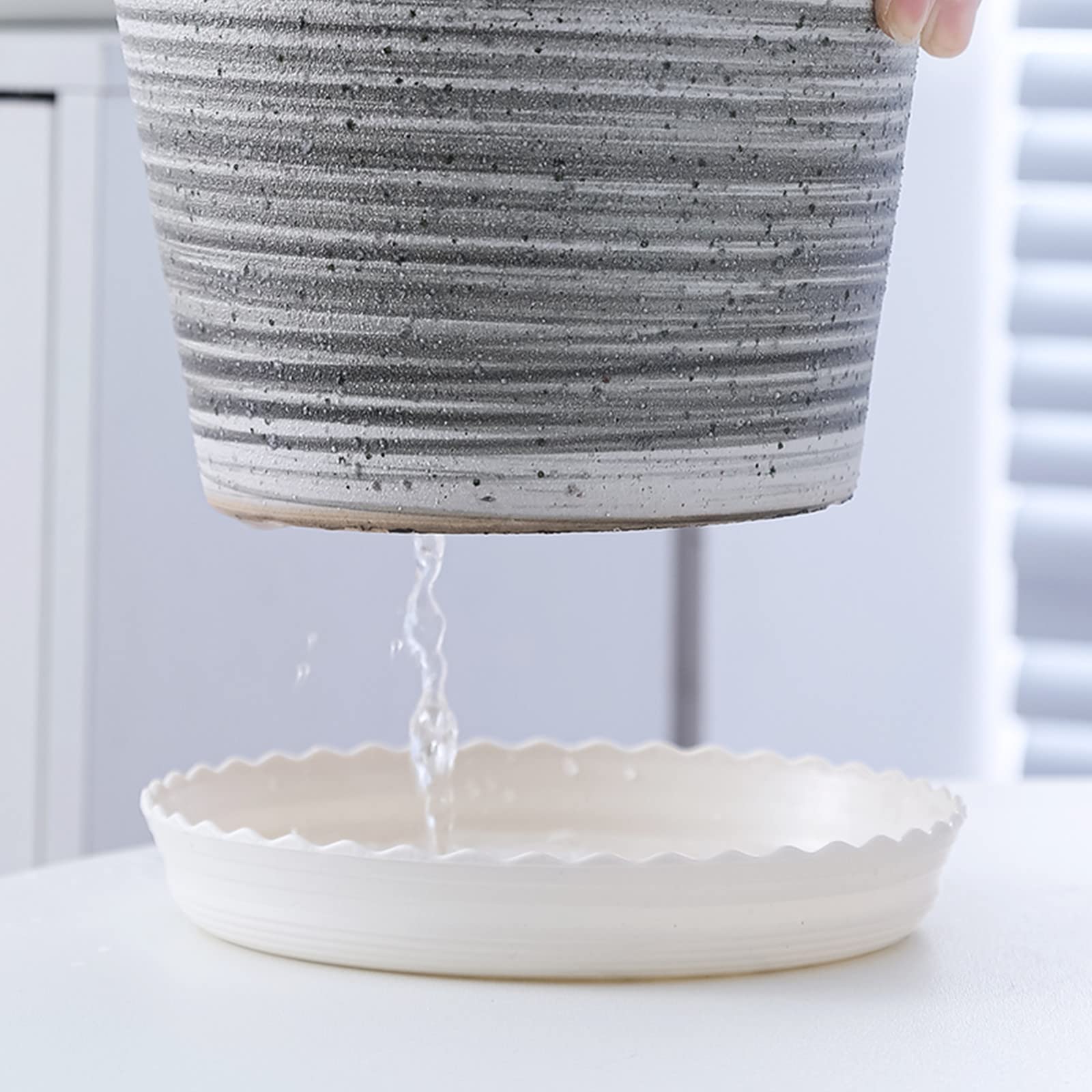 ZOOFOX indoor outdoor use saucer accommodates pots on shelves and patios.
