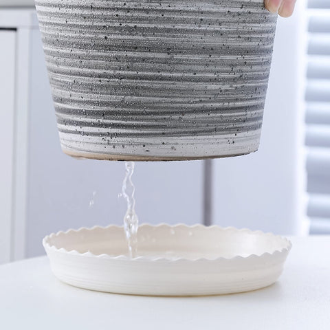 ZOOFOX indoor outdoor use saucer accommodates pots on shelves and patios.